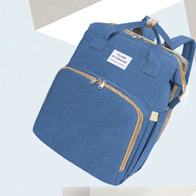 Sac à dos à langer pliable avec lit bébé intégré et poches isothermes – Grande capacité