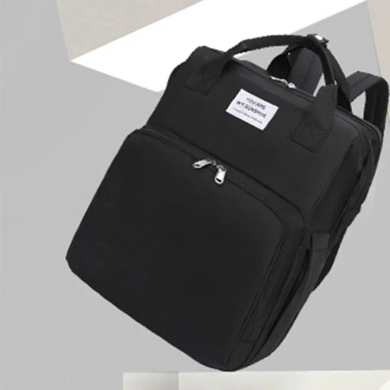 Sac à dos à langer pliable avec lit bébé intégré et poches isothermes – Grande capacité