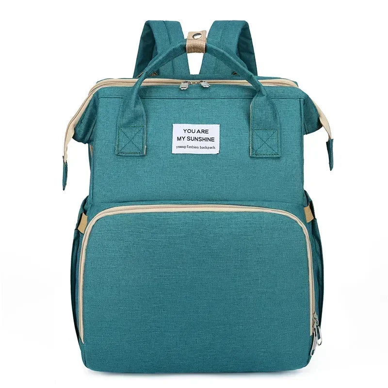 Sac à dos à langer pliable avec lit bébé intégré et poches isothermes – Grande capacité