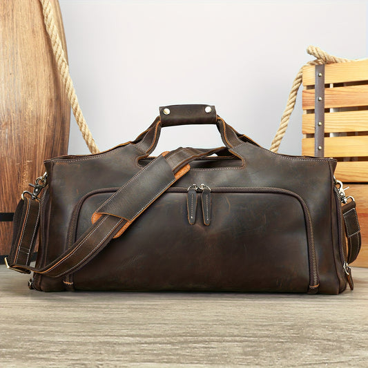Sac de voyage en cuir, format cabine, allure vintage — détail de la matière : cuir