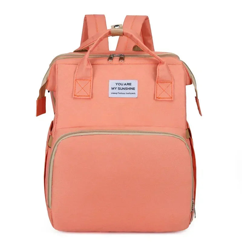 Sac à dos à langer pliable avec lit bébé intégré et poches isothermes – Grande capacité