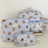 Trousse de toilette bébé à motifs ourson, coloris beige