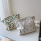 Pochette bébé fleurie rangement couches et accessoires de soin