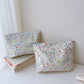 Pochette bébé fleurie rangement couches et accessoires de soin